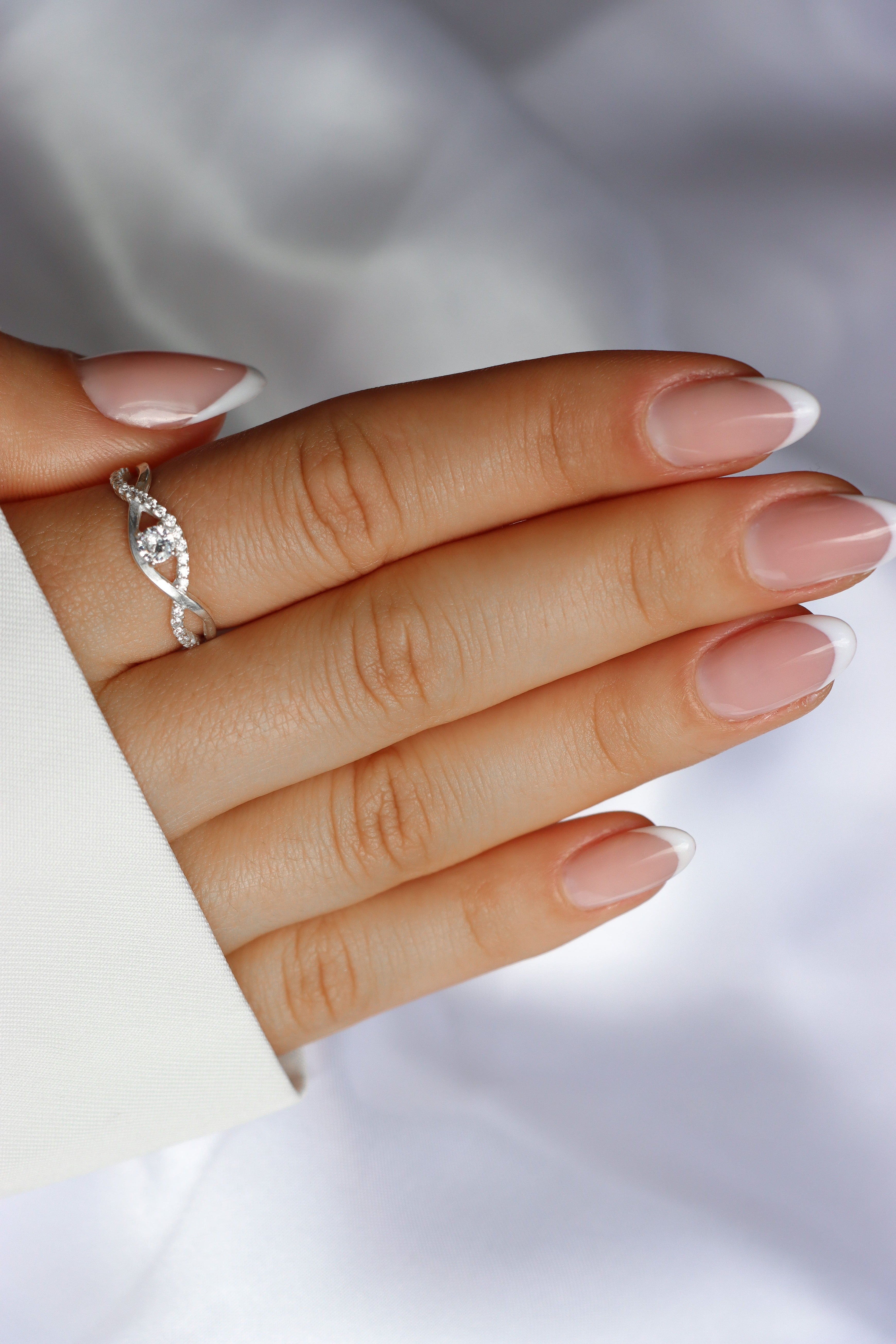 CROSS DIAMOND SOLITAIRE RING