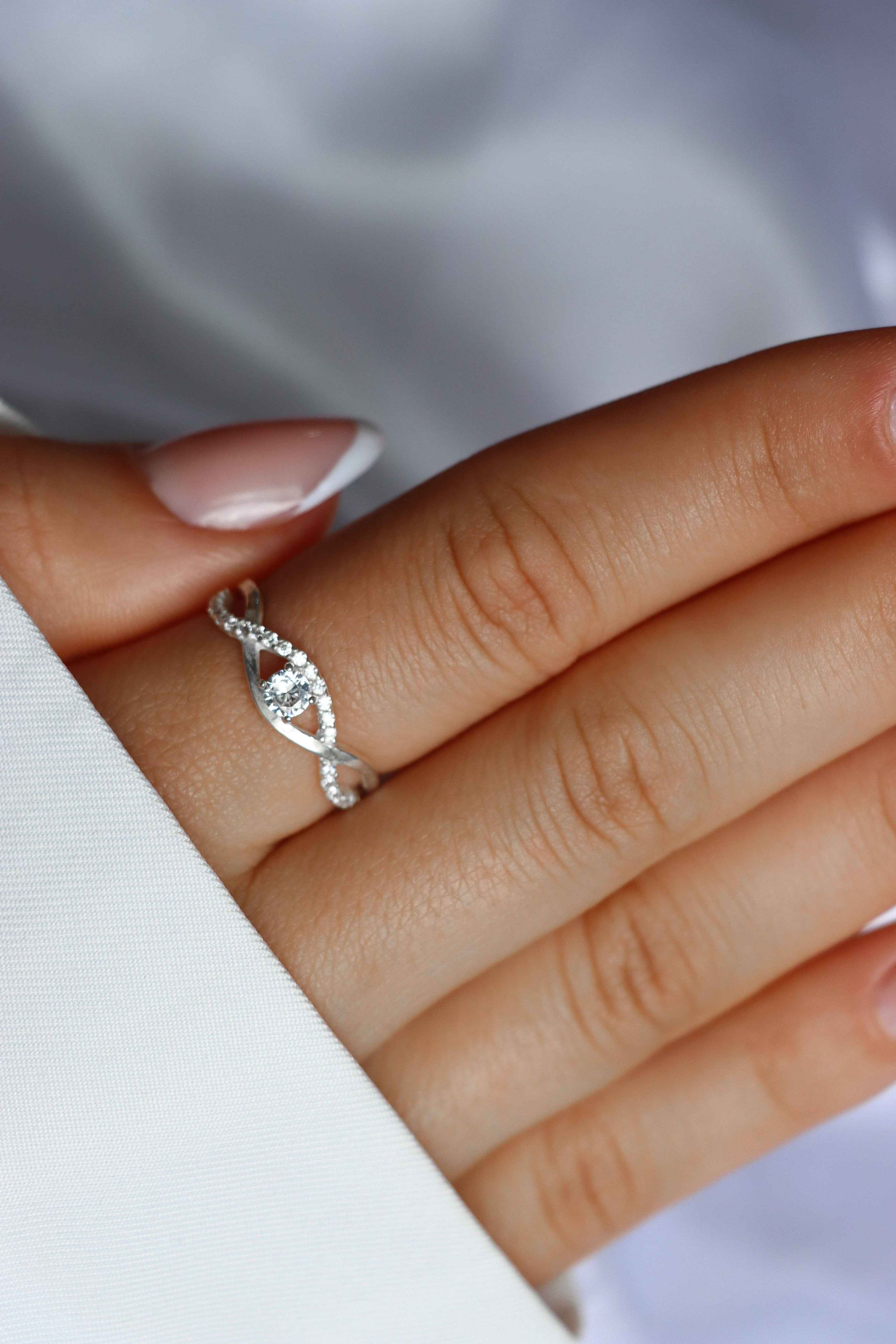 CROSS DIAMOND SOLITAIRE RING