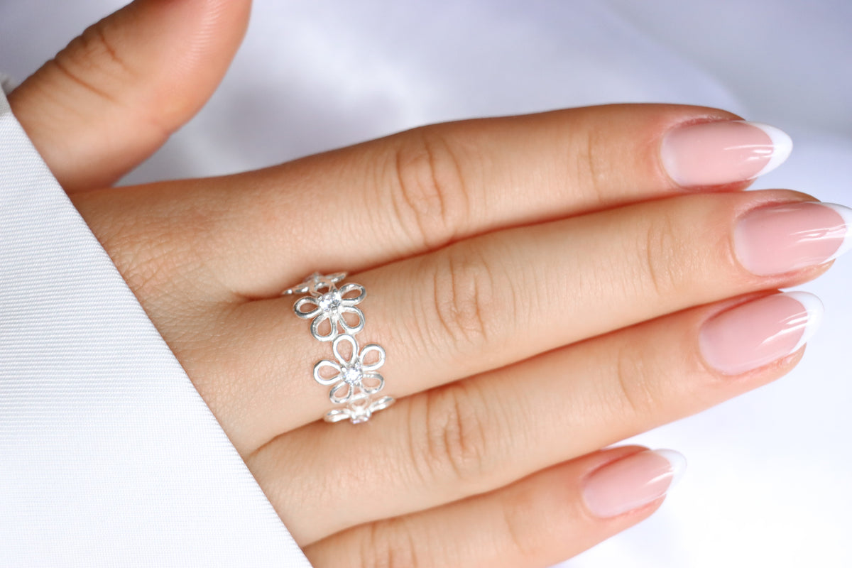 ADJUSTABLE FIVE FLOWERS RING